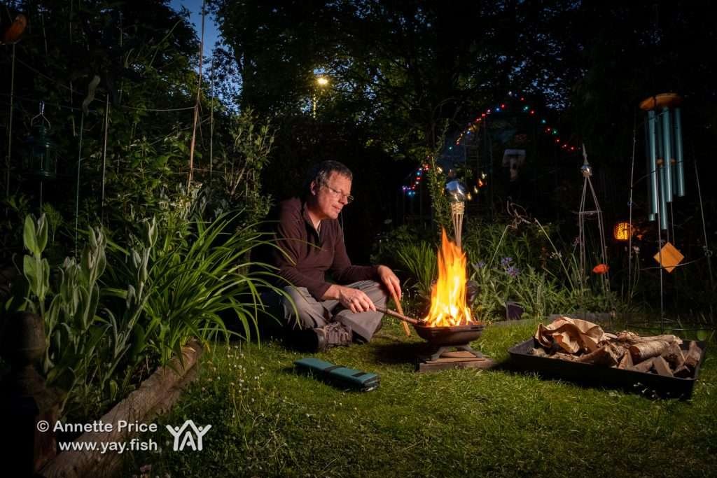 Tending the Garden Campfire.