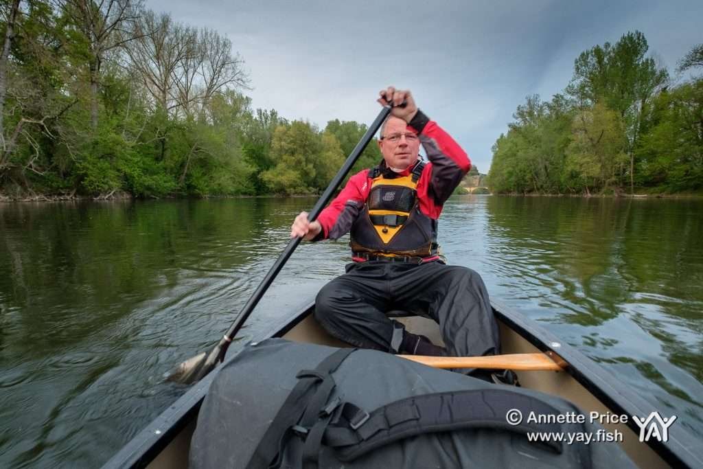 Canoeing on the River Dordogne, before setting up to wild camp for the night. France.