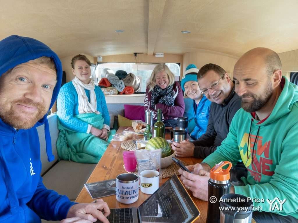 Around the breakfast table. Dave Cornthwaite (left). Wild camping course at the Yes Bus. Part of Say Yes More. West Sussex, UK.