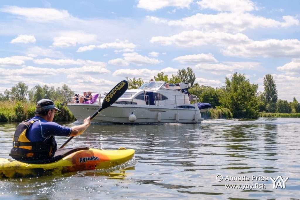 Paddling the Thames in Berkshire, near Shiplake, UK.